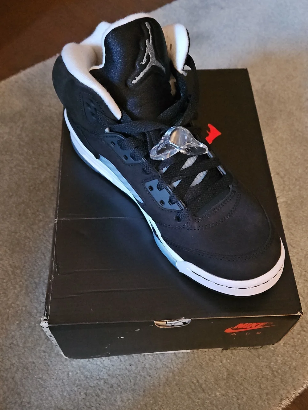 Jordan Men’s Mid-Top Sneaker in Black and White